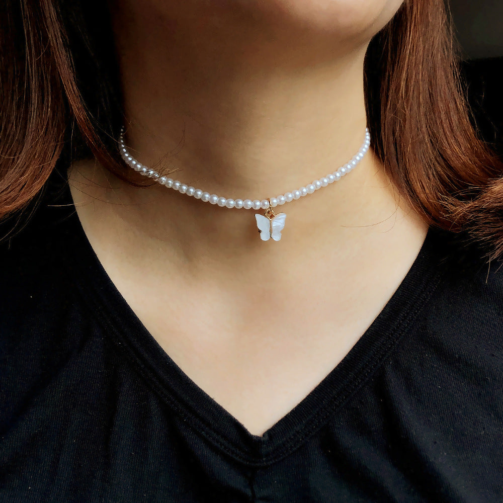 Collier ras du cou élégant en perles blanches et petites perles rondes pour mariage