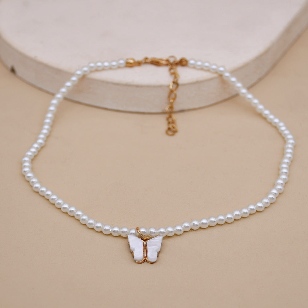 Collier ras du cou élégant en perles blanches et petites perles rondes pour mariage