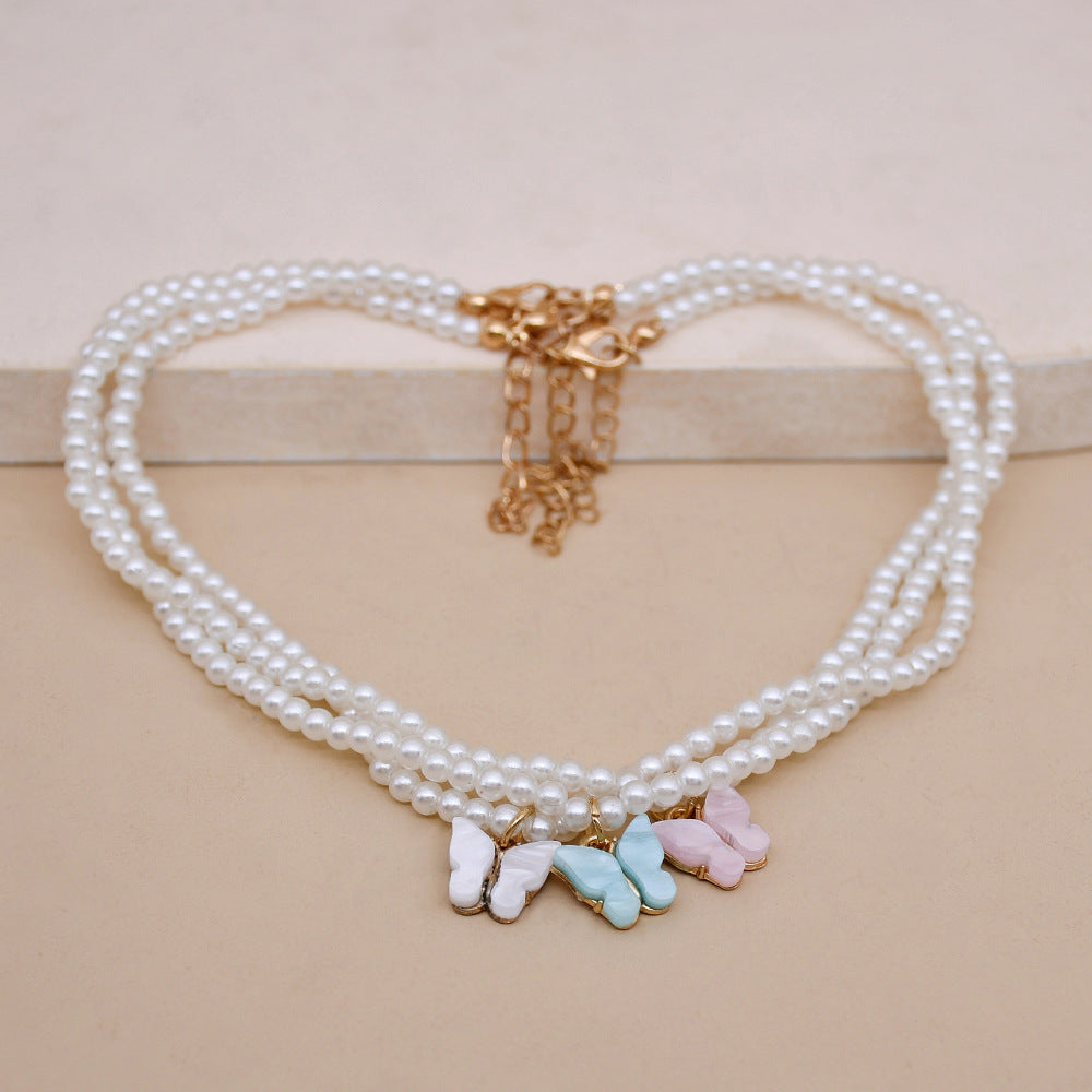 Collier ras du cou élégant en perles blanches et petites perles rondes pour mariage