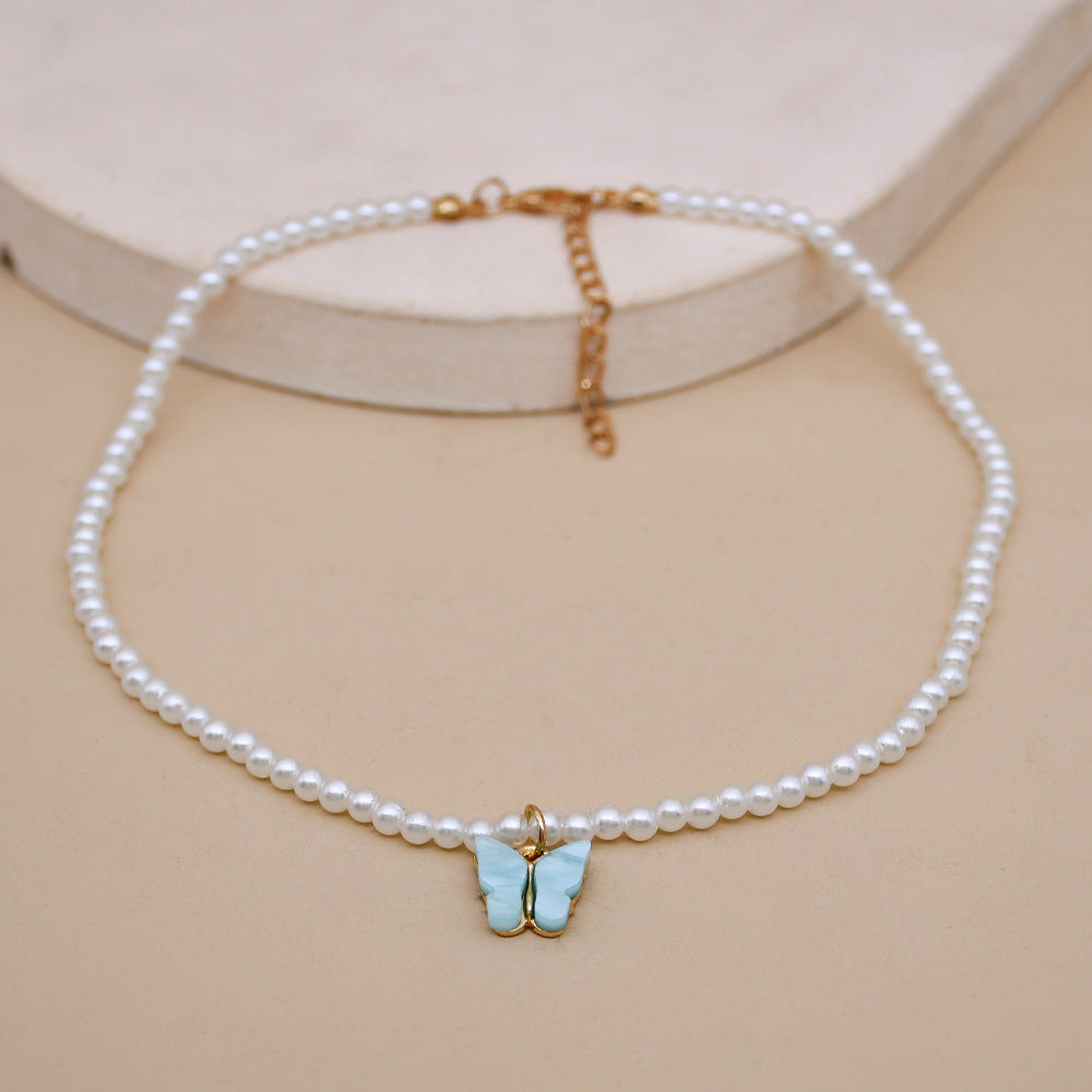 Collier ras du cou élégant en perles blanches et petites perles rondes pour mariage
